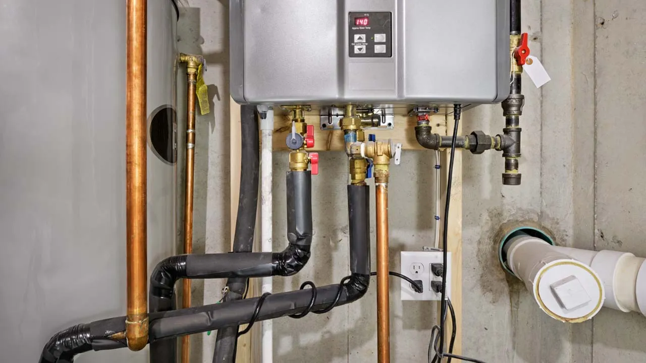 Water heater tank installation in utility room